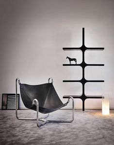 Baffo, Design armchair in leather and metal