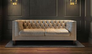 MODERN CHESTER, Sofa with elegant sinuosity and a cosmopolitan character